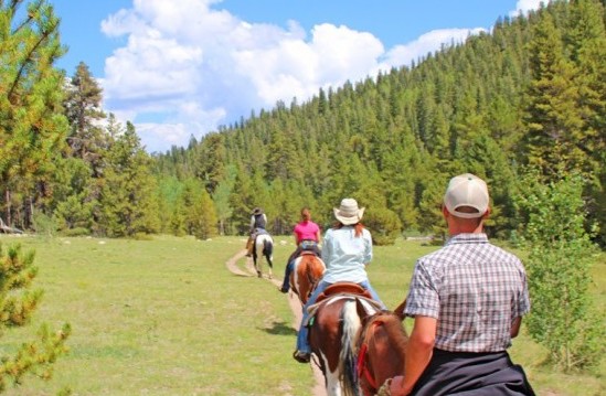 Family vacation ideas in Colorado: Horseback riding.