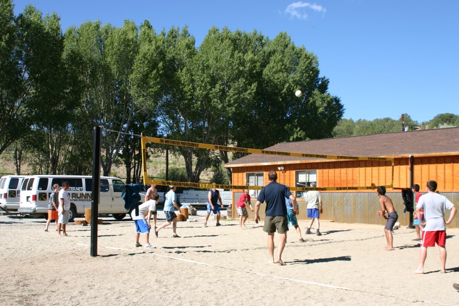 Riverside Campground Boy Scout Troop Playing Sand Volleyball. 